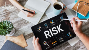photo of tablet with the word risk
