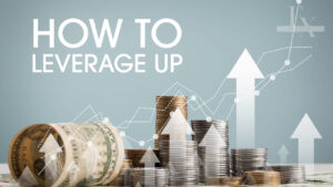photo of money and arrows pointing up with the text How to Leverage Up