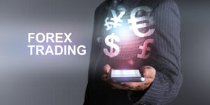photo of person with computer and the words forex trading